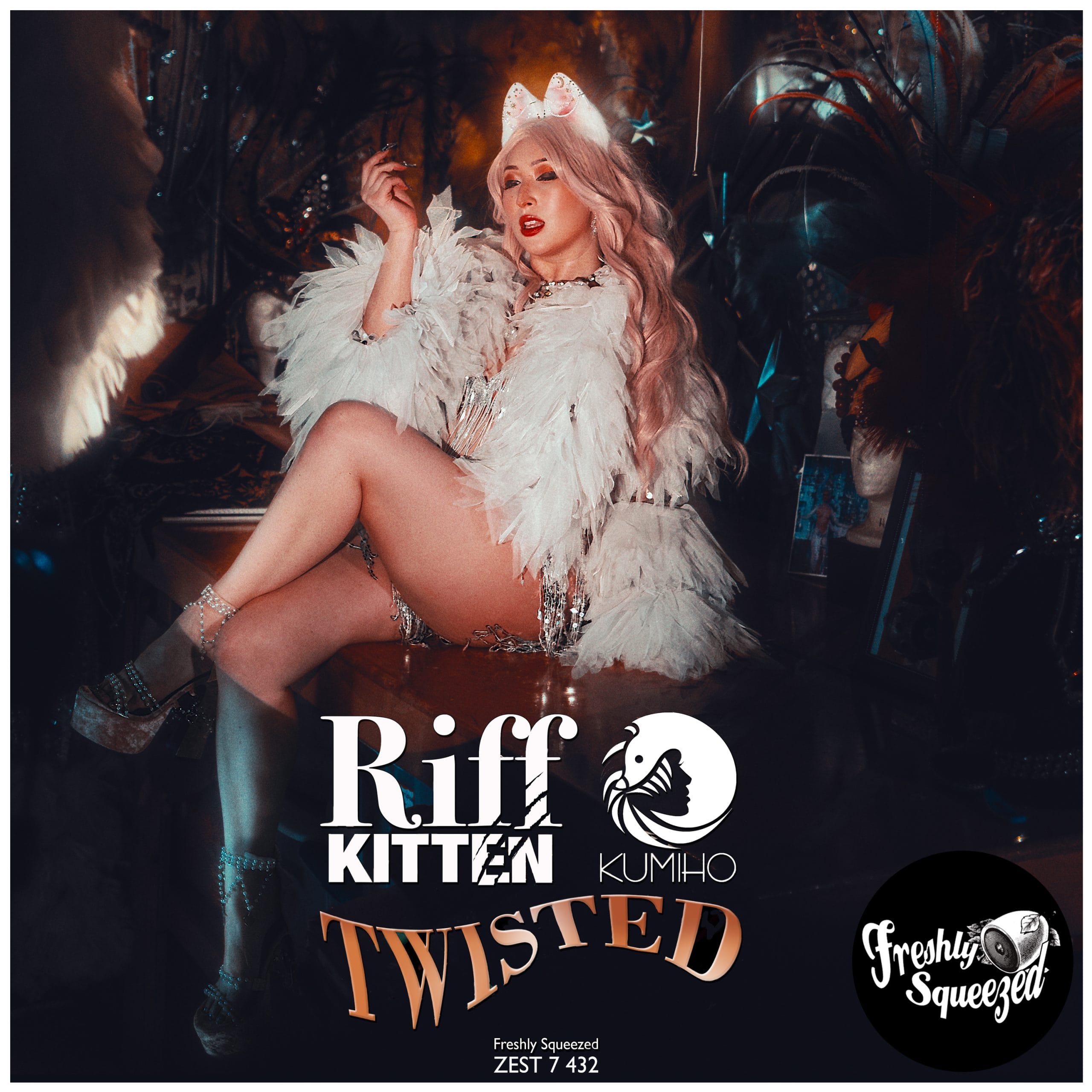 TWISTED single cover by Riff Kitten and KUMIHO featuring KUMIHO in a white feathered outfit against a dark backdrop.
